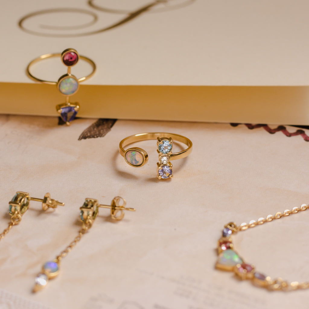 Anel Zora II Água Marinha, Tanzanita, Opala, Brilhante e Ouro 18k Kahla